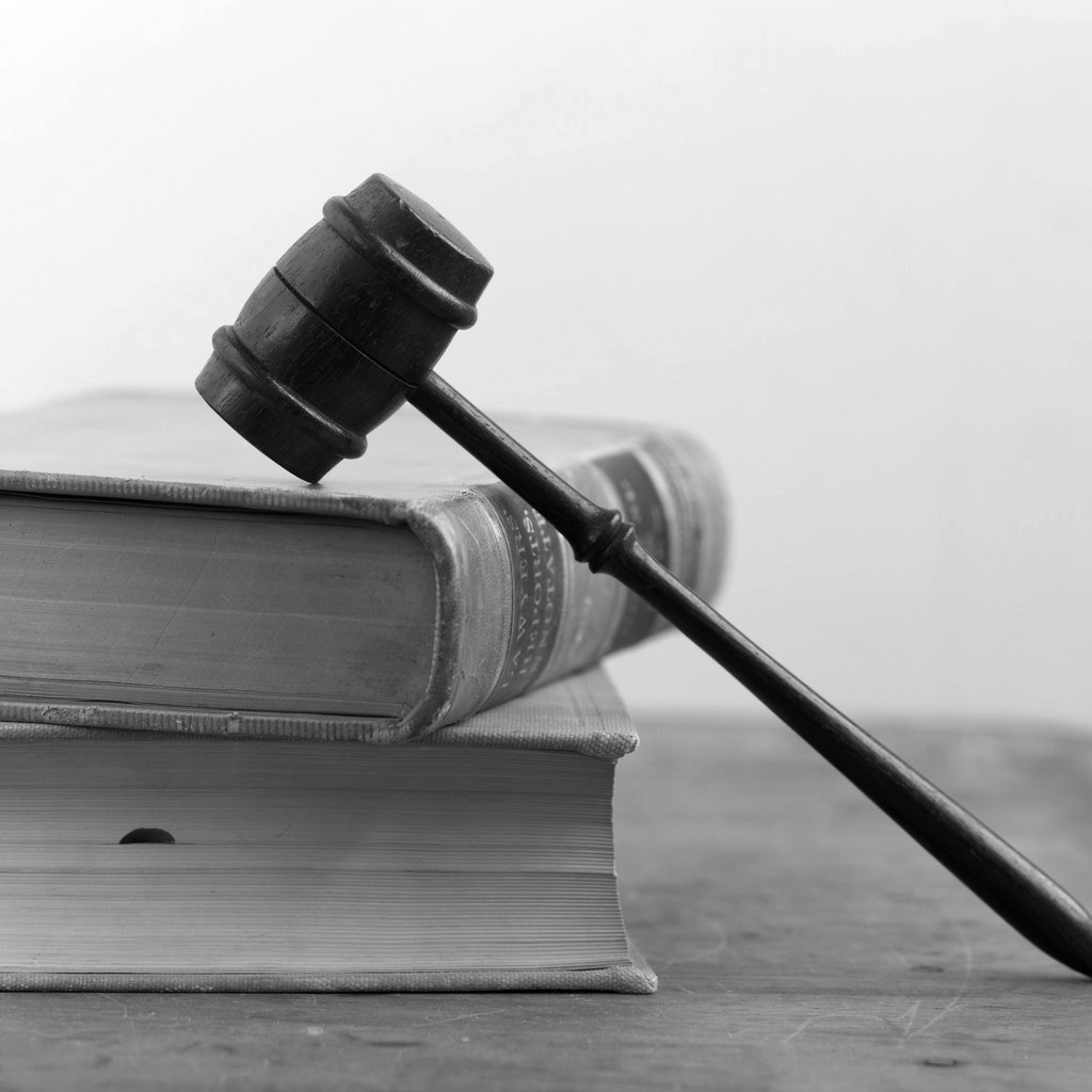 a judge's gavel on law books